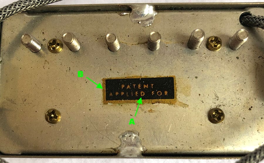Vintage Gibson humbuckers with raised decal lettering